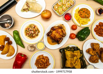 Top view image of set of dishes with recipes of European and Latin food on wooden table, tamales, empanadas, salpicon, roast chicken, burritos, Italian pasta - Powered by Shutterstock