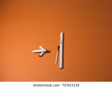 A top view image of several commercially made cigarettes.