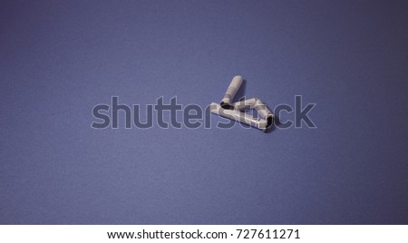 A top view image of several commercially made cigarettes.