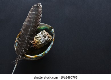 A Top View Image Of A Spiritual Smudge Kit On A Black Background. 