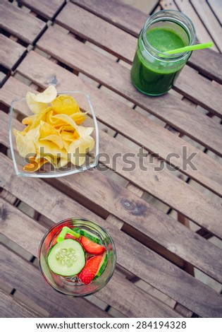 Infused fruit water cocktails and green vegetable smoothies