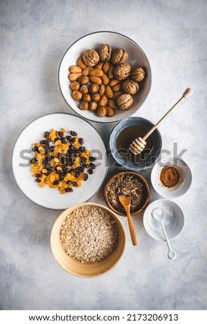 Similar – Zutaten für ein gesundes Frühstück mit Joghurt, Beeren und Chiasamen. Eine leere Schüssel, Draufsicht.