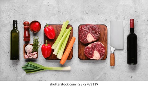 Top view of ingredients for ossobuco on stone background - Powered by Shutterstock