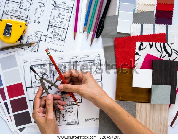Top view of Interior
designer& architect working as home decoration and renovation
concept