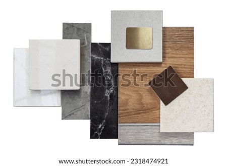 top view of interior luxury sample materials including black and gery marble stones, wooden vinyl flooring tiles, grainy quartz, ceramic tiles isolated on background with clipping path.