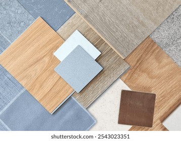 top view of interior material samples contains wooden laminate flooring tile, artificial stone, wooden vinyl flooring tile, quartz stone, grey fabric, gold brushed stainless, stone tile in top view.