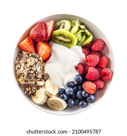 Top view of isolated fruit and yoghurt bowl with cereals, kiwi, strawberries, banana, blueberries and raspberries. - Shutterstock ID 2100495787