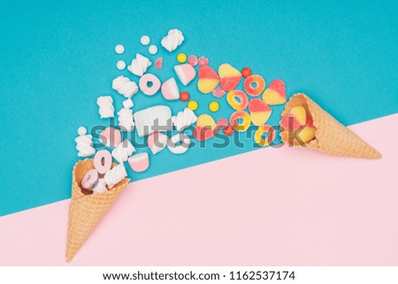 Similar – Ice cream cone with heart and moon shaped marshmallows on top