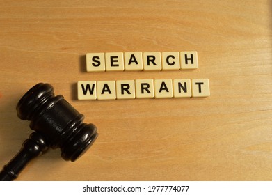 Top View Of Judge Gavel And Alphabet Letters With Text SEARCH WARRANT.