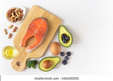 Top View Of Keto Or Ketogenic Diet On White Wooden Background, Low Carb Eating With High Protein And Good Fat Source