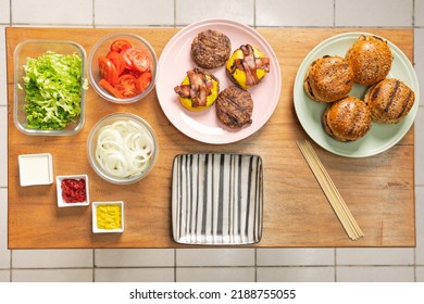 Top View Of A Kitchen With Ingredients For A Sandwich Of Hamburger