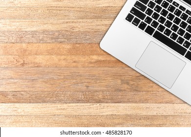 Top view laptop computer with mobile phone and tablet on office desk.Business template mock up for adding your text