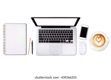 Top view laptop computer or notebook,mobile phone and cup of latte art coffee on wooden table. Business template mock up for adding your text.
