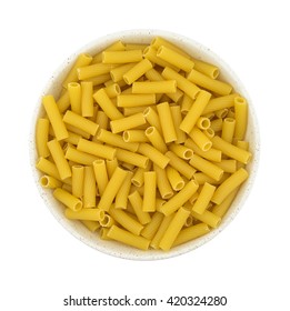 Top View Of A Large Bowl Filled With Rigatoni Pasta Isolated On A White Background.