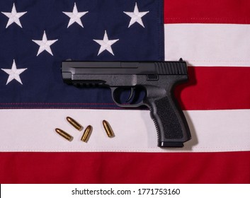 Top View of Large Firearm with Golden Bullets on United States Flag