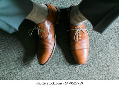 Top View Of Men’s Leather Dress Shoes, Groom On Wedding Day, Getting Ready Retail Shot, Plaid Socks