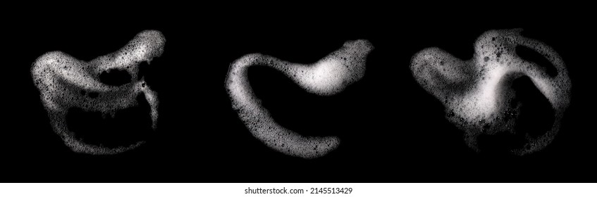 Top View, Liquid White Foam From Soap Or Shampoo Or Shower Gel. Abstract Bubbles. Isolated On A Black Background 