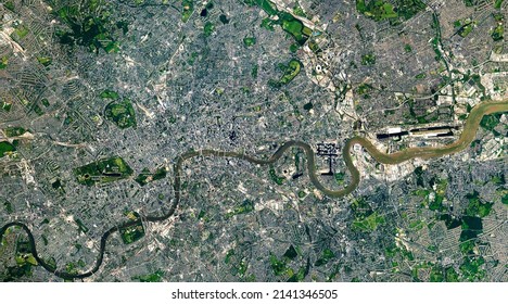Top view of London, the Capital city from space, London map, Aerial view of Hyde Park, Buckingham Palace, Kensington Gardens, River Thames, grids. Elements of this image furnished by NASA. - Shutterstock ID 2141346505