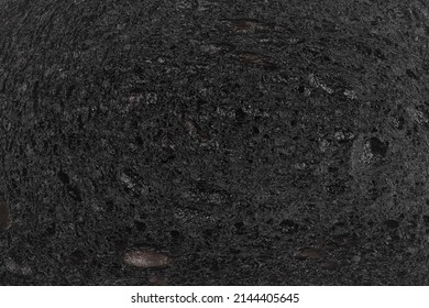 top view macro closeup of black burnt toast bread slice texture background