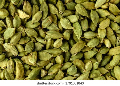 Top view macro closeup on plenty of green cardamom spice, horizontal format - Powered by Shutterstock