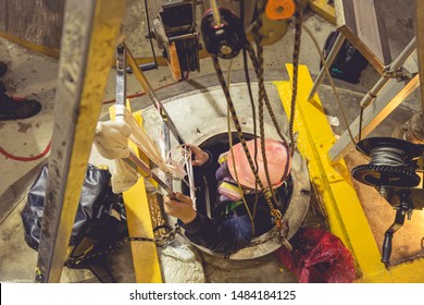 Top View Male Climb Up The Stairs Into The Tank Stainless Chemical Area Confined Space Save Lives With Rescue Rope Safety