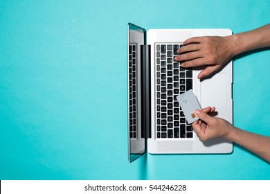 Top view of male hands making online payment - Shutterstock ID 544246228