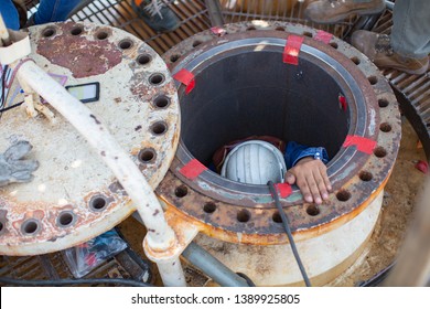 Top View Male Worker Climb Down The Stairs Into The Tank Spherical Propane Tank Area Confined Space Safety Blower Fresh Air