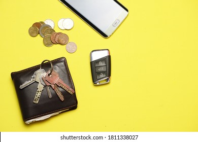 Top View Of Man Carry Items. Smart Phone Money Car Keys And House Keys. Flat Lay Flat Design