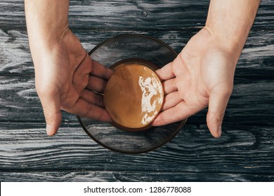 Top View Of Man Putting Kombucha Mushroom Into Jar