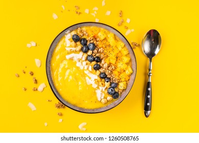 Top View Of Mango Smoothie Bowl With Fruits