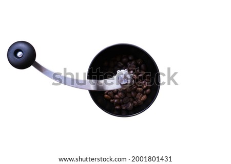 Top view of manual coffee grinder isolated on white background with clipping path.