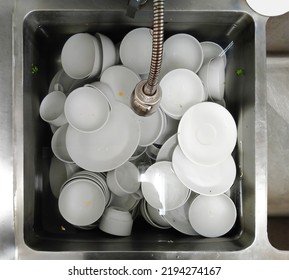 Top View Many Dirty Dishes In Kitchen Sink