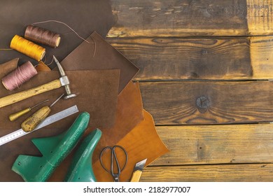 Top view materials and instruments on cutting mat for chopping measurement leatherwork details. Process of handwork manufacturing with equipment exclusive quality stuff at leather workshop - Powered by Shutterstock