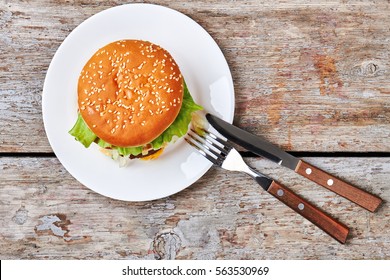 Top View Of Meal. Utensil With Burger On Plate. Daily Norm Of Calories.