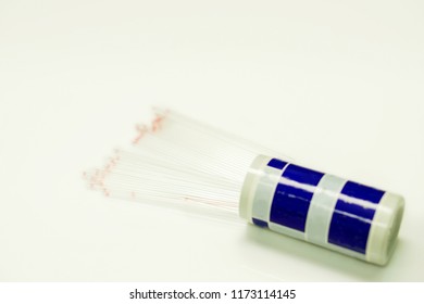 Top View Of Medical Capillary Glass Tube Spread And Container On Light Gray Background., Designed For Both Safe Blood Collection As Well As Accurate Micro-hematocrit Determinations Precision.