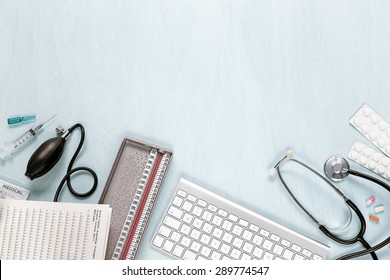 Top View Of Medical Equipment On A Blue Desk