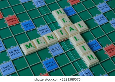 Top view of mental health words on scrabble board game. health care concept