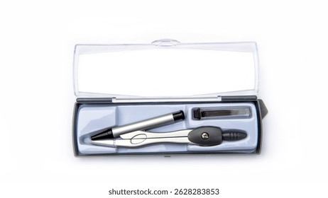 Top view of a metal compass set in a transparent plastic case, including spare pencil leads. Ideal for school, drafting, or technical drawing on a white background.