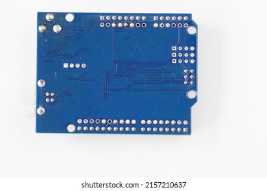 A top view of a microcontroller board isolated on a white background