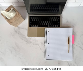 Top View Of Minimal Desk With Notebook Laptop And Tissue Box With White Marble Copy Space Remote Work Sick Day Concept