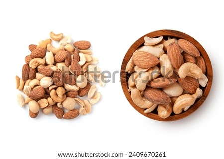 Top view of Mixed nuts in wooden bowl isolated on white background.