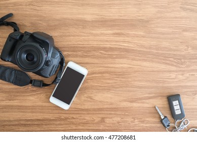 Top View Mobile Camera Car Keys On The Table.