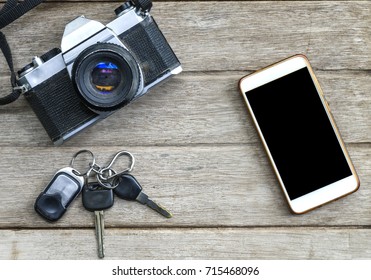 Top View Mobile, Old Camera, Car Keys On The Table.