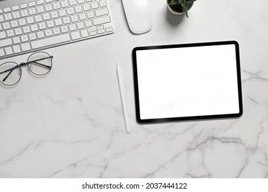 Top view mock up digital tablet with white screen and stylus pen on marble background. - Shutterstock ID 2037444122