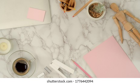 Top View Of Mock Up Scene Creator With Stationery, Coffee Cup, Laptop And Copy Space On Marble Desk