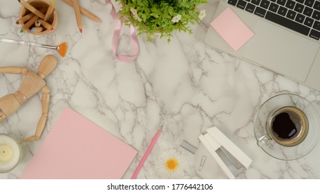 Top View Of Mock Up Scene Creator With Stationery, Coffee Cup, Laptop, Decorations And Copy Space On Marble Desk