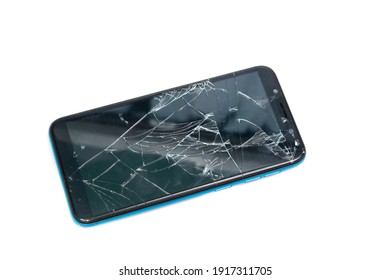 Top view Modern broken mobile phone isolated on white background. Cracked glass on a screen. Copy space for text. Smartphones repair concept