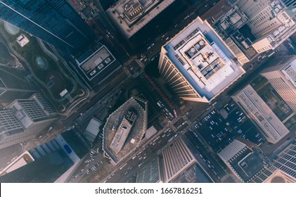 Top View Of Modern Cityscape Of Rooftops And Buildings In Business And Finance Center Of City,from Above Picture Of Skyscrapers With Rental Real Estate And Residential Apartments In Megalopolis