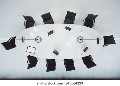 Top View Of Modern Conference Room With Oval Table 3D Render