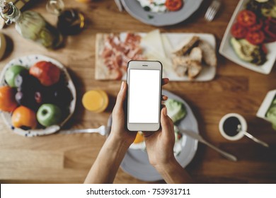 Top View Of Modern Smartphone With A Blank Screen With Space For Your Design Or Text Message, Mock-up Of Mobile Phone, Food Order Online Concept